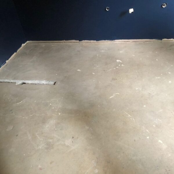 Wall painted , Floor screeded to insure adequate fall. Void installed for shower grate