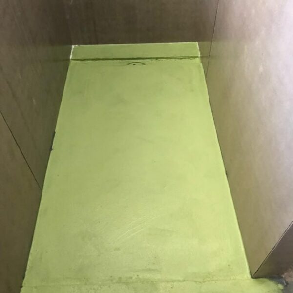 waterproofing the screed and ensuring the membrane on the floor is sealed to the Clear Waterproofing Membrane on the Cement sheeting to ensure good continuous seal