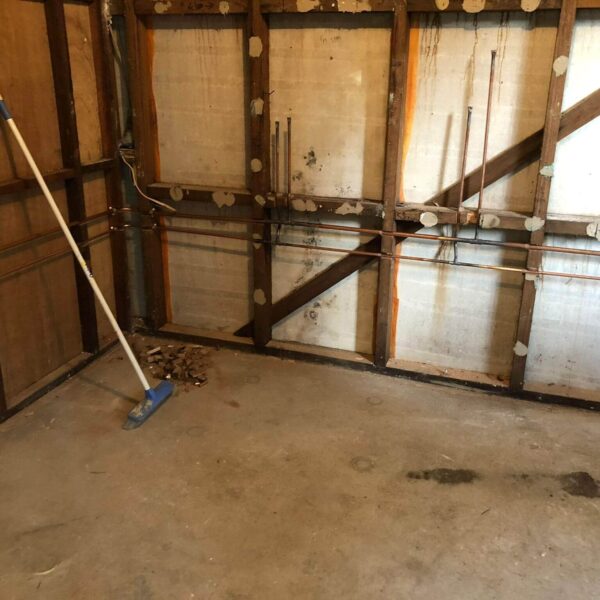 Existing sheeting removed to add in plumbing for bathroom