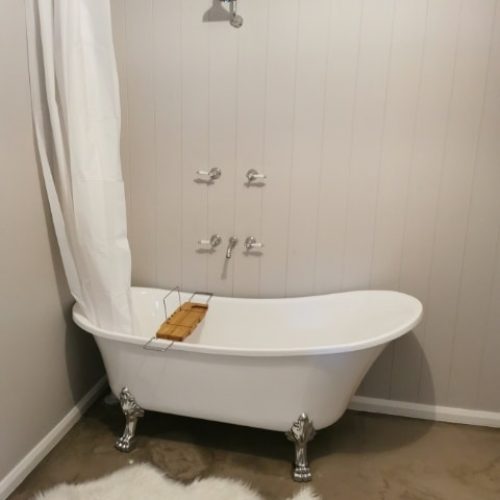 Bathroom on a budget bath view - Clear Waterproofing Membrane